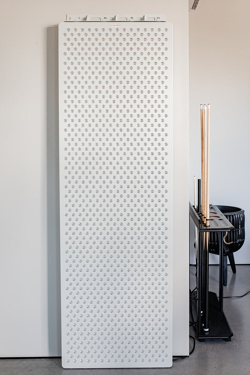 Large Red Light Therapy panel mounted against the wall