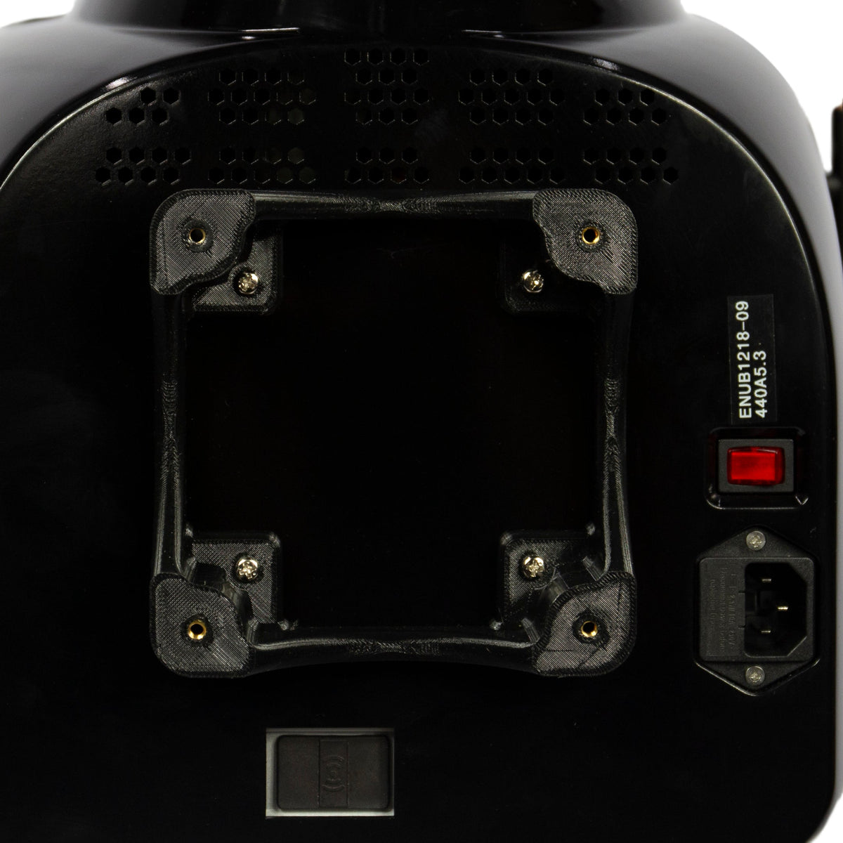 Back view of a black electronic device with visible branding and certification labels.